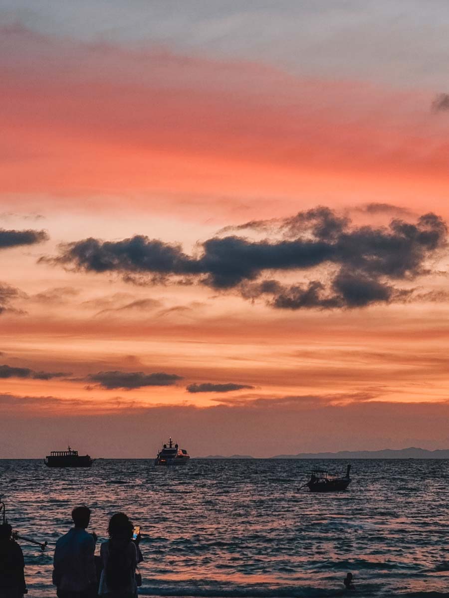 Watch the sun set at Railay Beach in Krabi Thailand