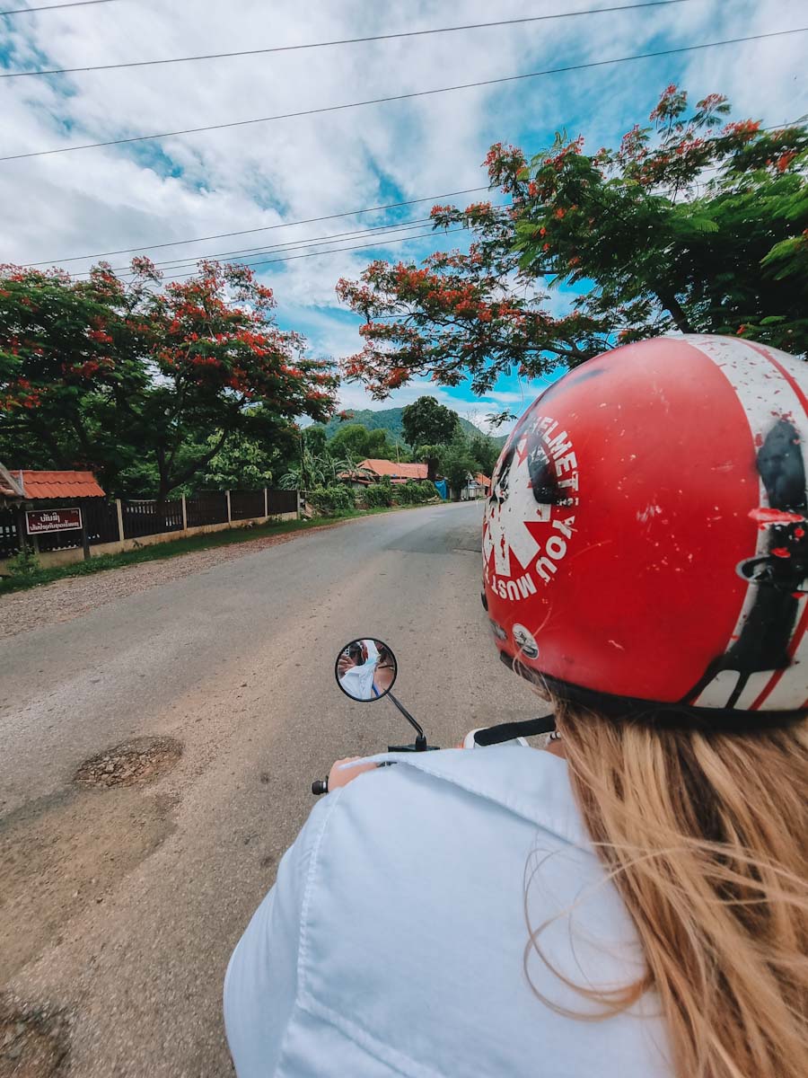 Rent a scooter in Luang Prabang to visit the stunning Kuang Si Waterfalls