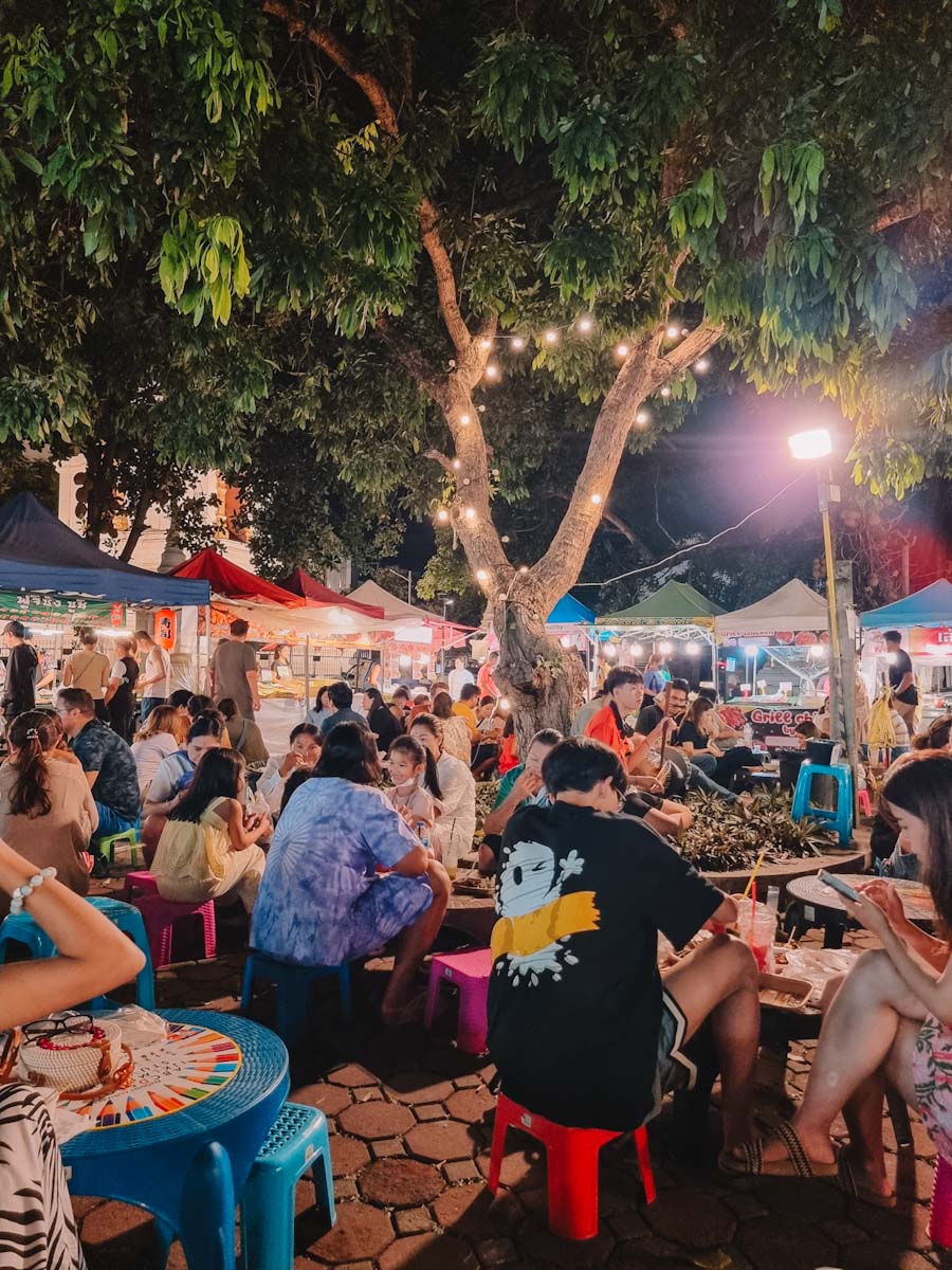 Eating at the Sunday night market square in Chiang Mai, Thailand