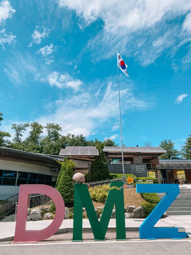 DMZ sign and South Korean flag near third infiltration tunnel