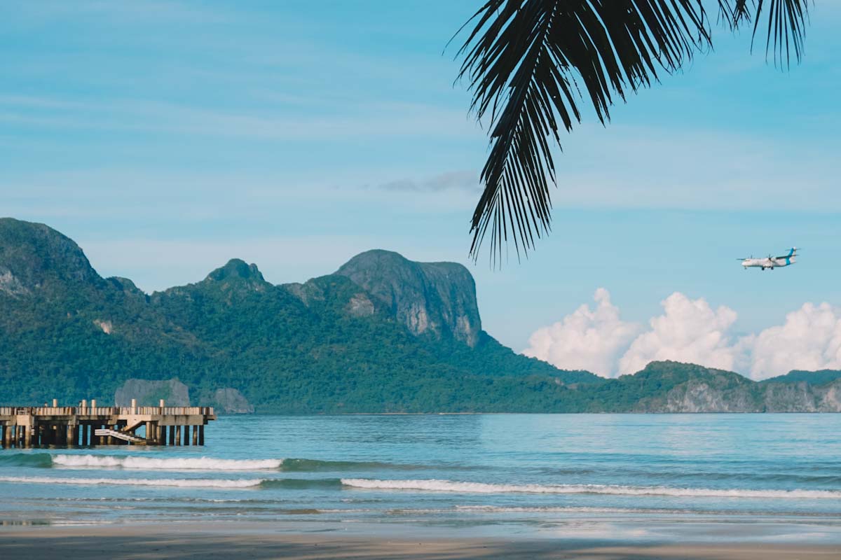 Incoming plane El Nido airport seen from Lio beach